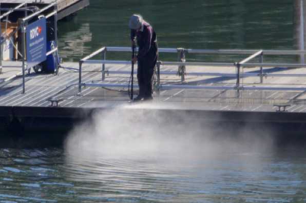 25 May 2020 - 08-52-48 
Blasting off the past. As the RDYC readies itself for visitors, the main pontoon gets a scrub down with a high pressure jet.
-------------------
RDYC pontoon cleaning.